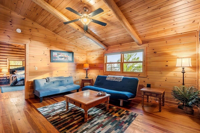3550 Princess Pond Rd, Summerton, SC 29148 - living room featuring wood ceiling, hardwood / wood-style flooring, ceiling fan, and wood walls