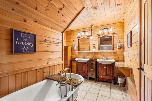 3550 Princess Pond Rd, Summerton, SC 29148 - full bath featuring wood walls, wooden ceiling, vanity, tile patterned flooring, and a soaking tub
