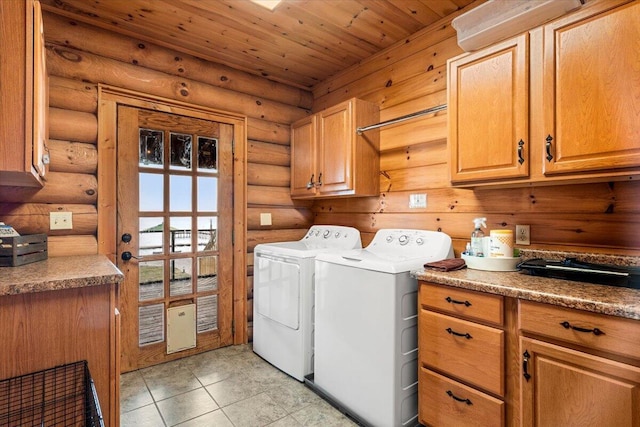 3550 Princess Pond Rd, Summerton, SC 29148 - laundry area with cabinet space, log walls, washer and clothes dryer, wooden ceiling, and light tile patterned floors
