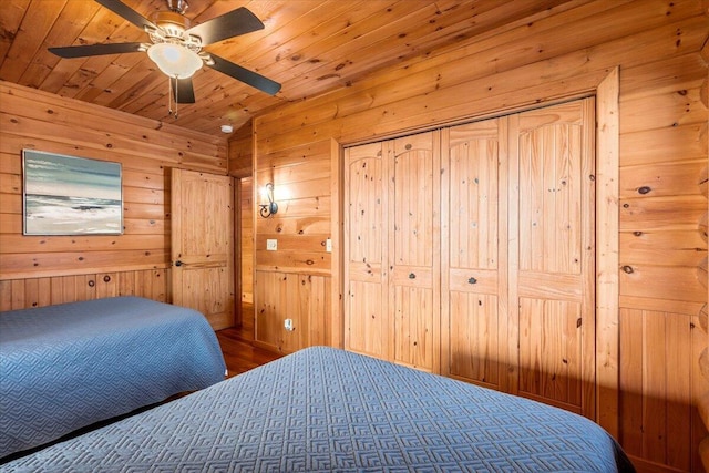 3550 Princess Pond Rd, Summerton, SC 29148 - bedroom with wood walls, wood ceiling, wood finished floors, and ceiling fan
