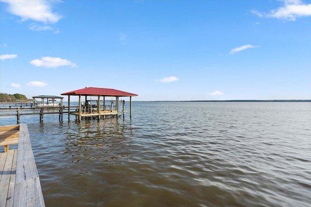3550 Princess Pond Rd, Summerton, SC 29148 - dock area with a water view and boat lift