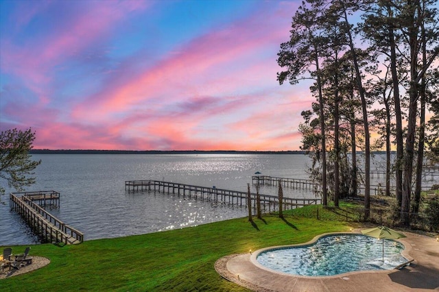 3550 Princess Pond Rd, Summerton, SC 29148 - pool at dusk with a water view, a lawn, and an outdoor pool