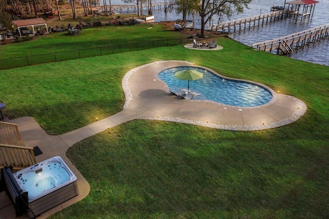 3550 Princess Pond Rd, Summerton, SC 29148 - view of swimming pool featuring a hot tub and a water view