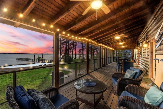 3550 Princess Pond Rd, Summerton, SC 29148 - sunroom featuring ceiling fan, beam ceiling, and a water view