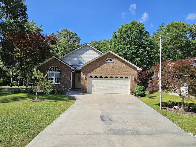 single story home featuring a garage, a front lawn, concrete driveway, and brick siding