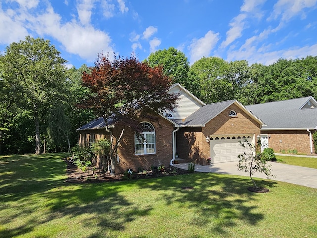 view of front of house with a garage, brick siding, concrete driveway, and a front yard