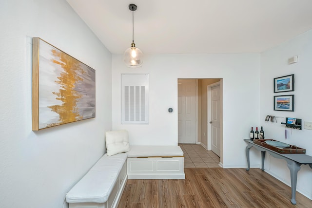 sitting room featuring wood-type flooring