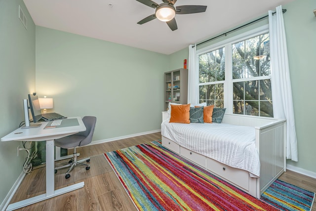 bedroom featuring hardwood / wood-style floors