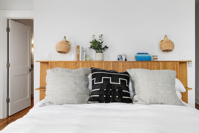 bedroom with hardwood / wood-style flooring