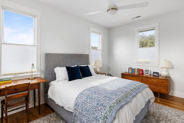 bedroom featuring dark wood-type flooring and ceiling fan