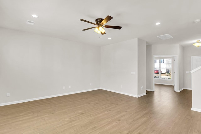 unfurnished room featuring hardwood / wood-style flooring and ceiling fan