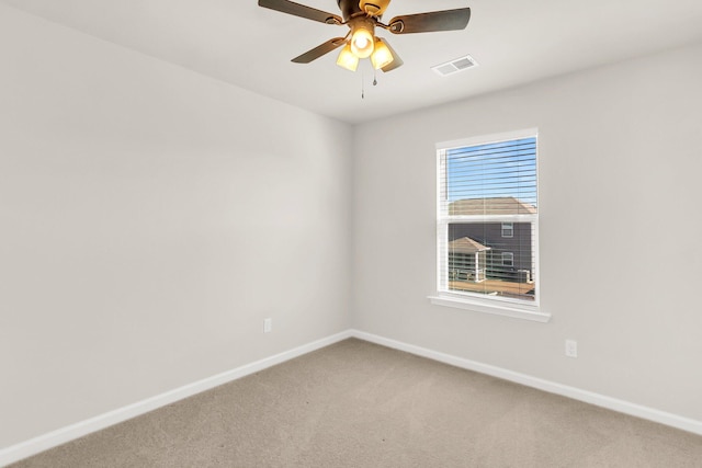 carpeted empty room with ceiling fan