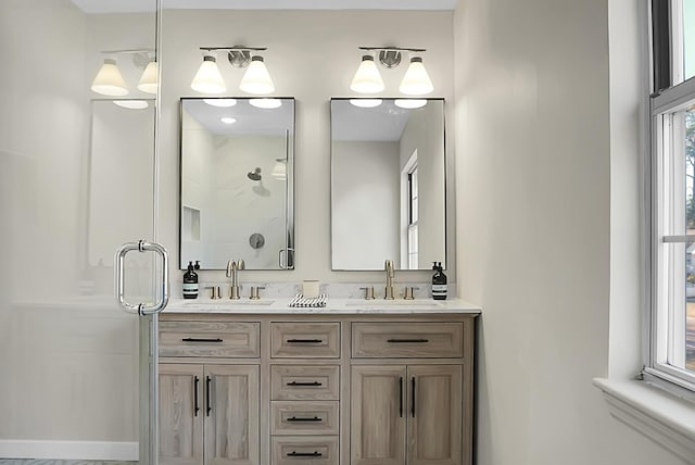 bathroom featuring vanity and an enclosed shower