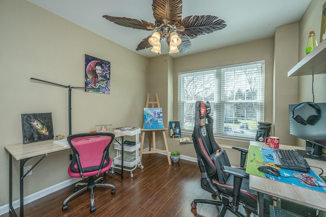 office space with a ceiling fan, wood finished floors, and baseboards