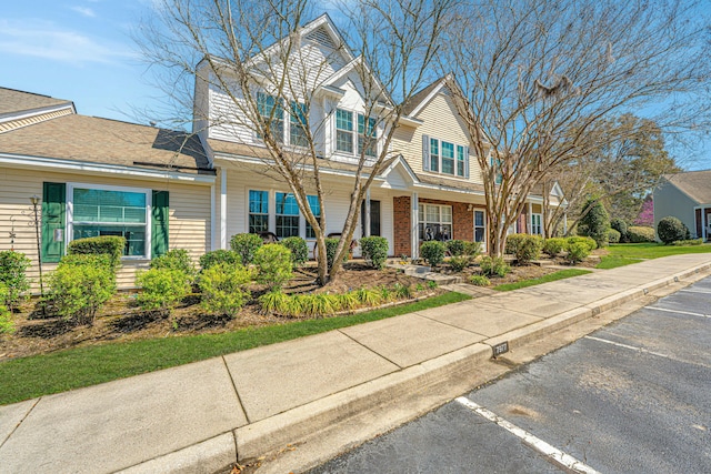 view of front of home with uncovered parking