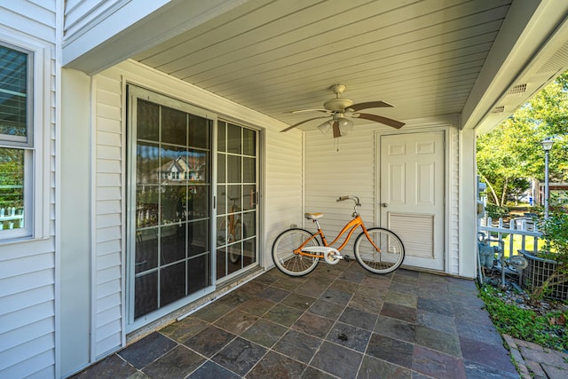 view of patio featuring ceiling fan