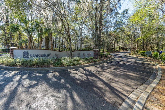 view of road featuring curbs