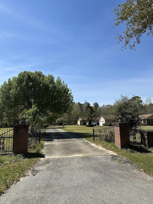 7819 Bells Hwy, Ruffin, SC 29475 - view of road featuring a gated entry and driveway