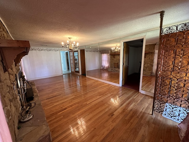 7819 Bells Hwy, Ruffin, SC 29475 - interior space with crown molding, a textured ceiling, wood finished floors, and a notable chandelier