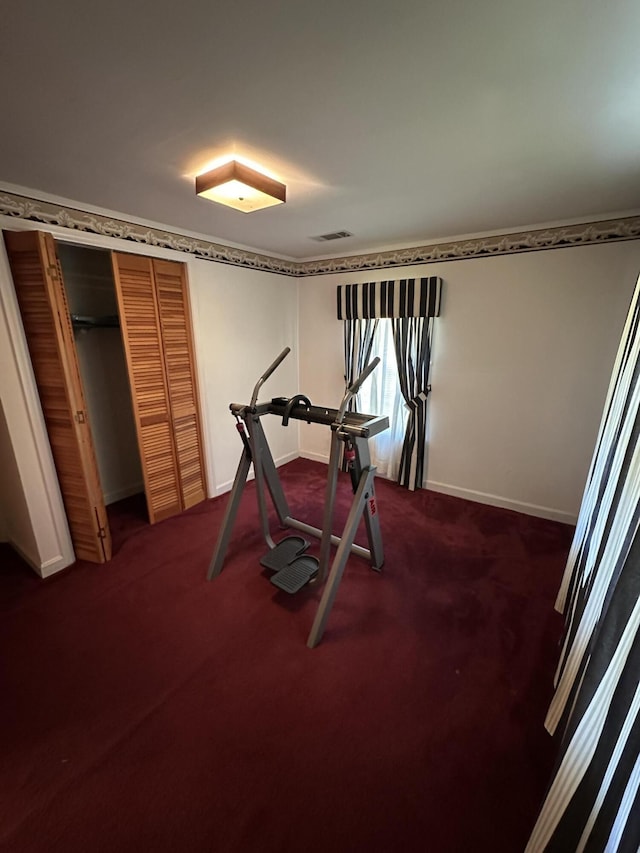 7819 Bells Hwy, Ruffin, SC 29475 - workout room with baseboards, visible vents, and dark colored carpet