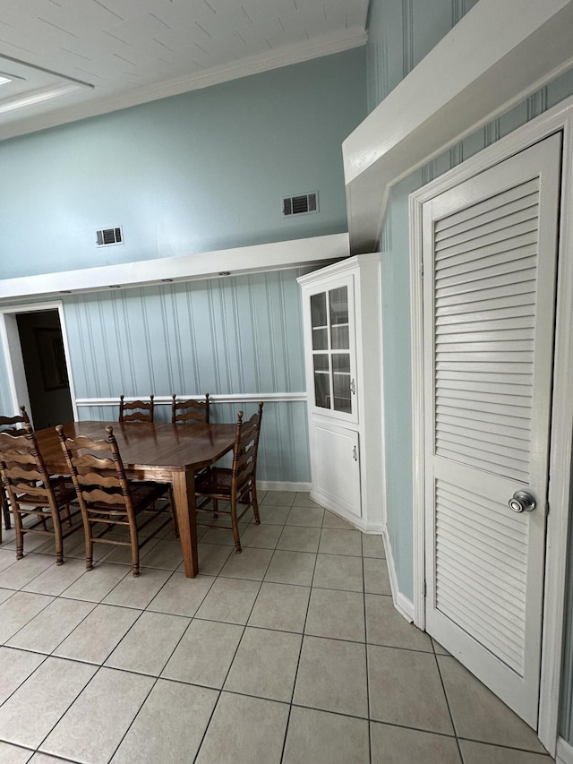 7819 Bells Hwy, Ruffin, SC 29475 - dining space featuring light tile patterned floors, crown molding, and visible vents