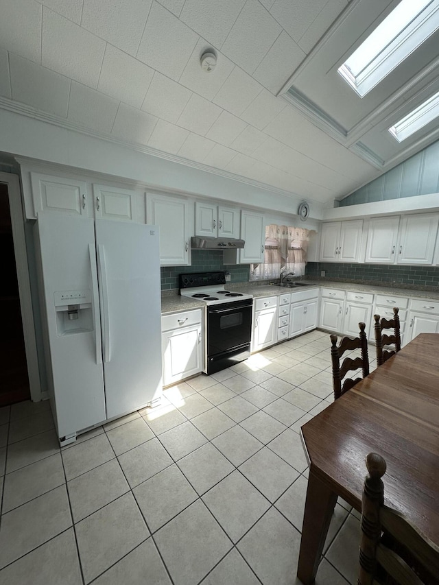 7819 Bells Hwy, Ruffin, SC 29475 - kitchen featuring under cabinet range hood, electric range oven, white refrigerator with ice dispenser, backsplash, and light tile patterned floors