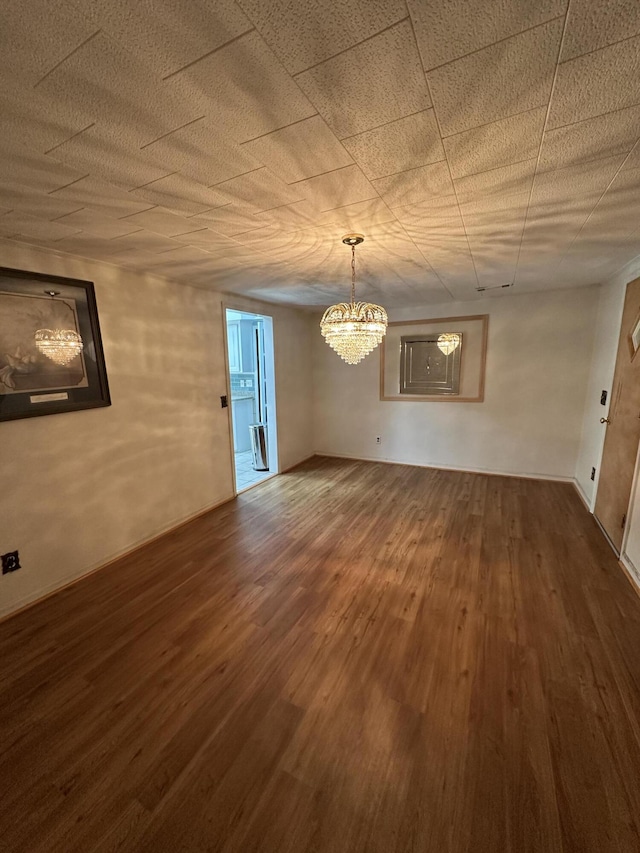 7819 Bells Hwy, Ruffin, SC 29475 - unfurnished dining area with an inviting chandelier and wood finished floors