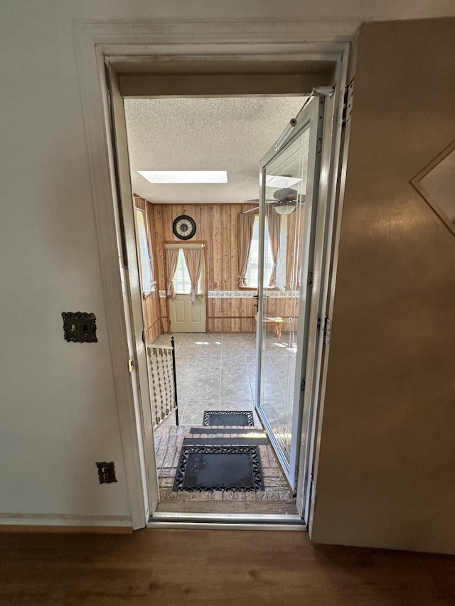 7819 Bells Hwy, Ruffin, SC 29475 - interior space with wooden walls, wood finished floors, and a textured ceiling