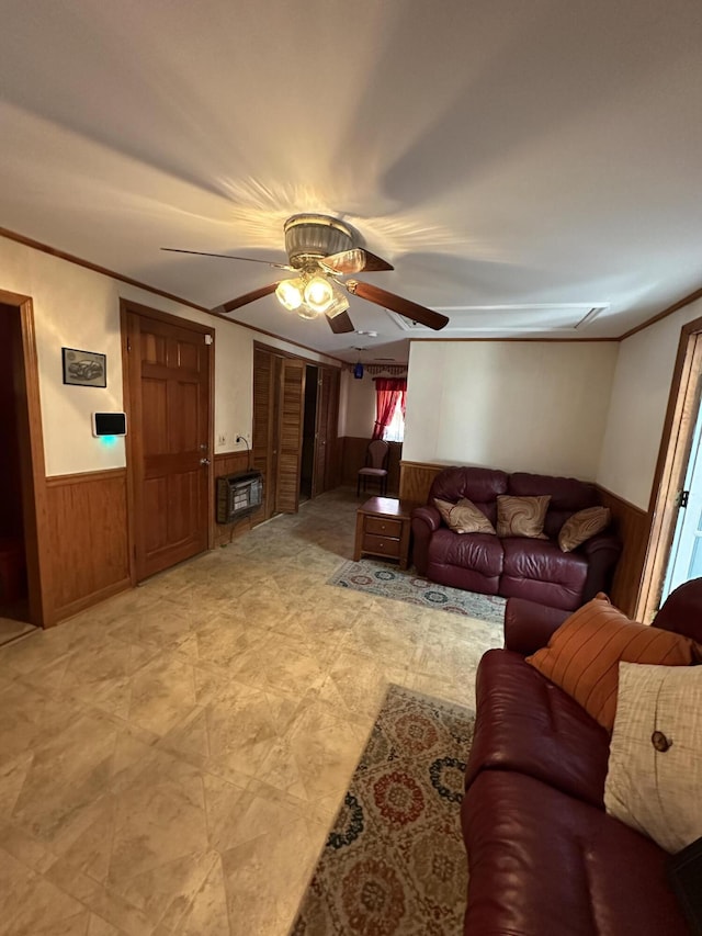 7819 Bells Hwy, Ruffin, SC 29475 - living area featuring a wainscoted wall, ceiling fan, wooden walls, and ornamental molding
