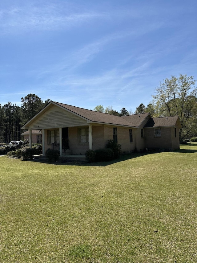 7819 Bells Hwy, Ruffin, SC 29475 - view of front of home featuring a porch and a front yard