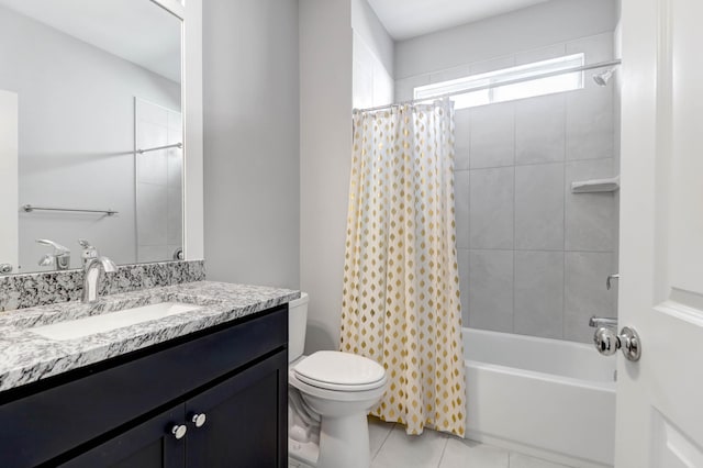 full bathroom with tile patterned floors, vanity, toilet, and shower / bath combo