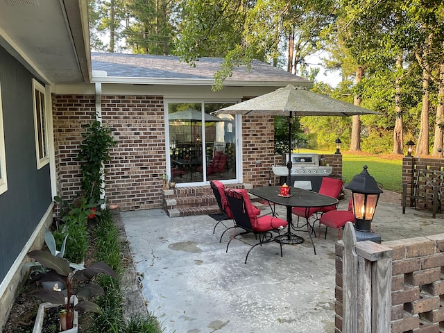 306 Park St, Saint George, SC 29477 - view of patio / terrace featuring outdoor dining area and entry steps