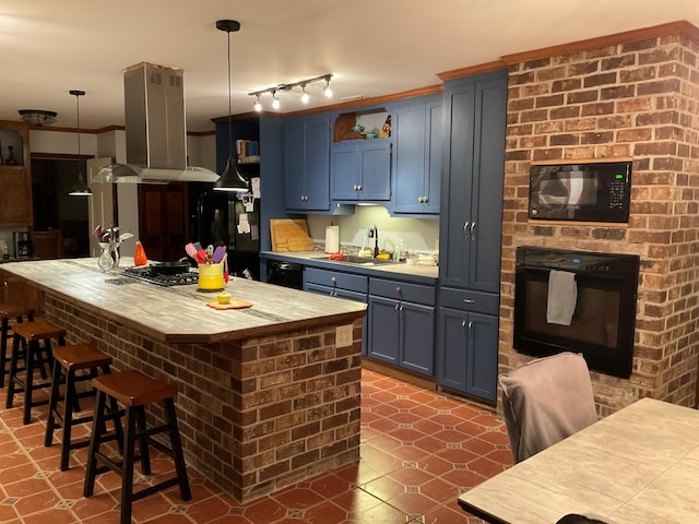 306 Park St, Saint George, SC 29477 - kitchen featuring island exhaust hood, black appliances, a breakfast bar area, a center island, and blue cabinets