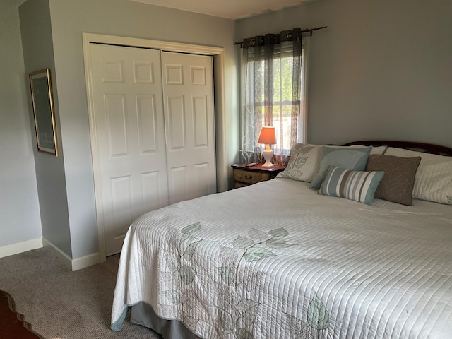 306 Park St, Saint George, SC 29477 - carpeted bedroom featuring a closet and baseboards