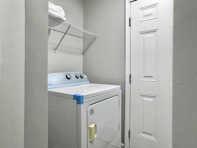 washroom featuring washer / clothes dryer