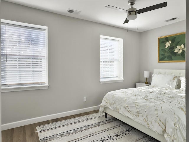 bedroom featuring wood-type flooring and ceiling fan