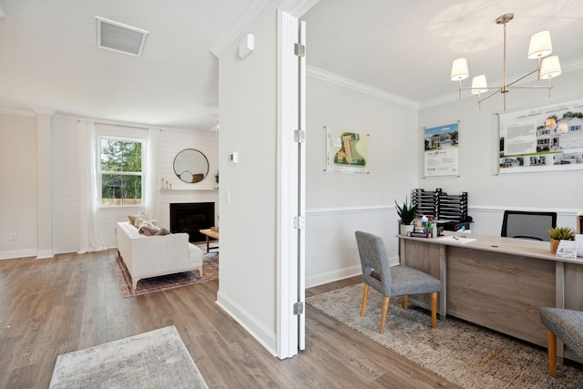 770 Opal Wing St, Moncks Corner, SC 29461 - office with wood finished floors, a chandelier, baseboards, ornamental molding, and a fireplace