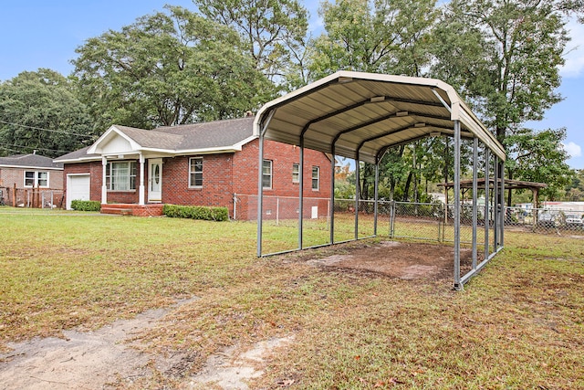 exterior space featuring a lawn and a carport