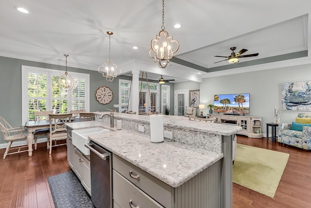 1033 Tuckers Rd, Pawleys Island, SC 29585 - kitchen with a sink, stainless steel dishwasher, ceiling fan with notable chandelier, and open floor plan
