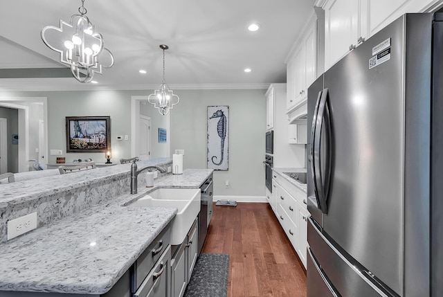 1033 Tuckers Rd, Pawleys Island, SC 29585 - kitchen featuring recessed lighting, black appliances, white cabinetry, a sink, and a notable chandelier