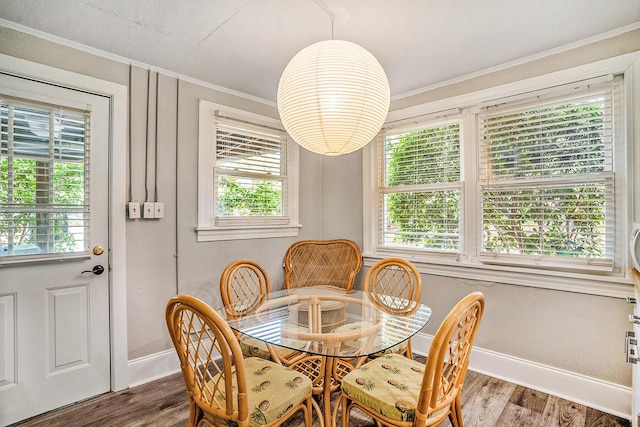 504 W Ashley Ave, Folly Beach, SC 29439 - dining room with crown molding and wood finished floors
