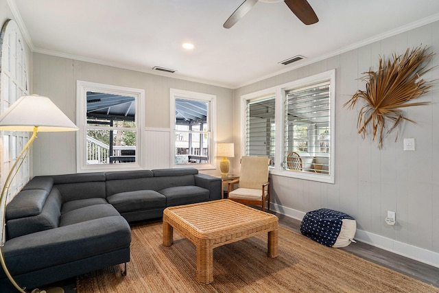 504 W Ashley Ave, Folly Beach, SC 29439 - living room with ornamental molding, wood finished floors, and a ceiling fan