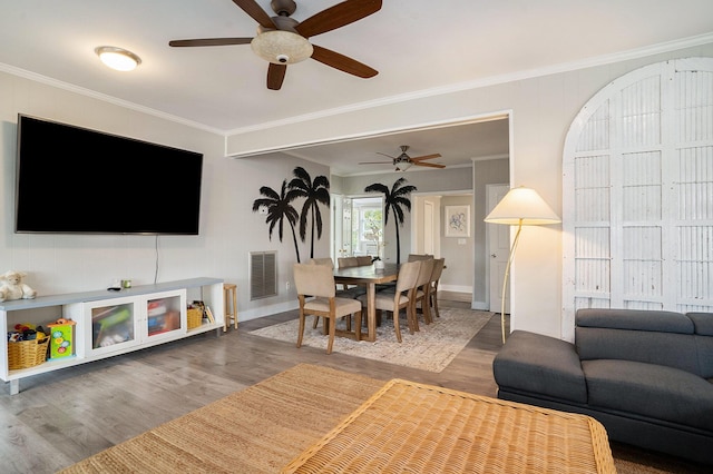 504 W Ashley Ave, Folly Beach, SC 29439 - living room featuring ceiling fan, wood finished floors, and ornamental molding