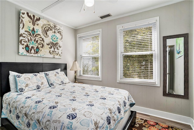 504 W Ashley Ave, Folly Beach, SC 29439 - bedroom featuring wood finished floors, ornamental molding, and ceiling fan
