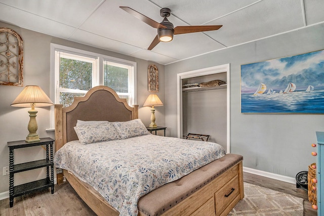 504 W Ashley Ave, Folly Beach, SC 29439 - bedroom featuring light wood-style flooring, a closet, and ceiling fan