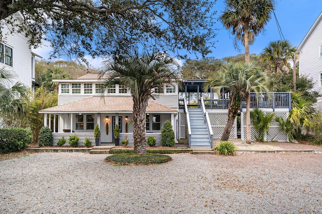 504 W Ashley Ave, Folly Beach, SC 29439 - view of front of property featuring stairway and roof with shingles