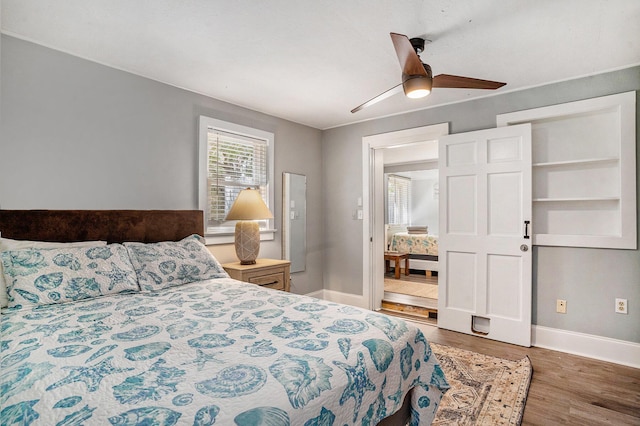 504 W Ashley Ave, Folly Beach, SC 29439 - bedroom with wood finished floors and ceiling fan