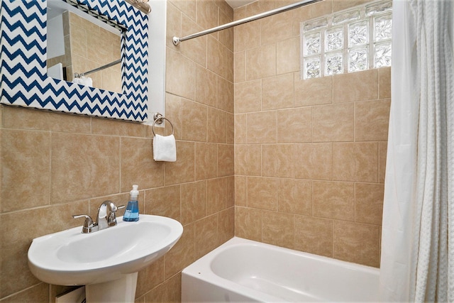 504 W Ashley Ave, Folly Beach, SC 29439 - full bathroom with shower / bath combination with curtain and tile walls