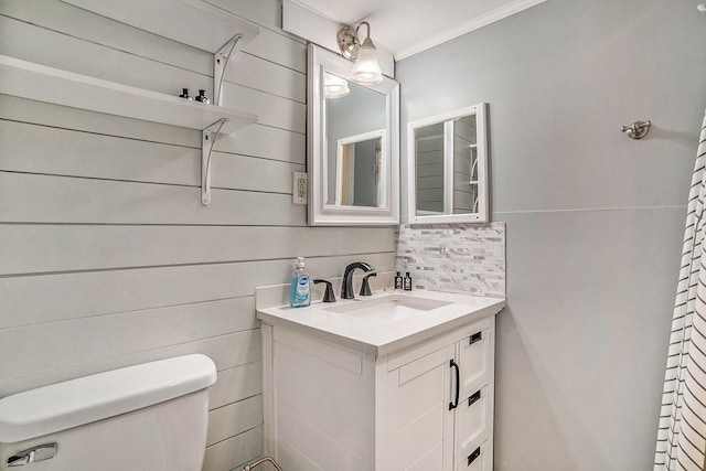 504 W Ashley Ave, Folly Beach, SC 29439 - bathroom featuring vanity, ornamental molding, and backsplash