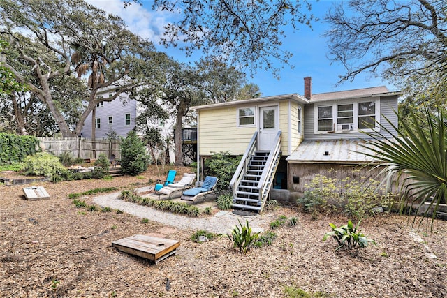 504 W Ashley Ave, Folly Beach, SC 29439 - back of property featuring a chimney and stairs